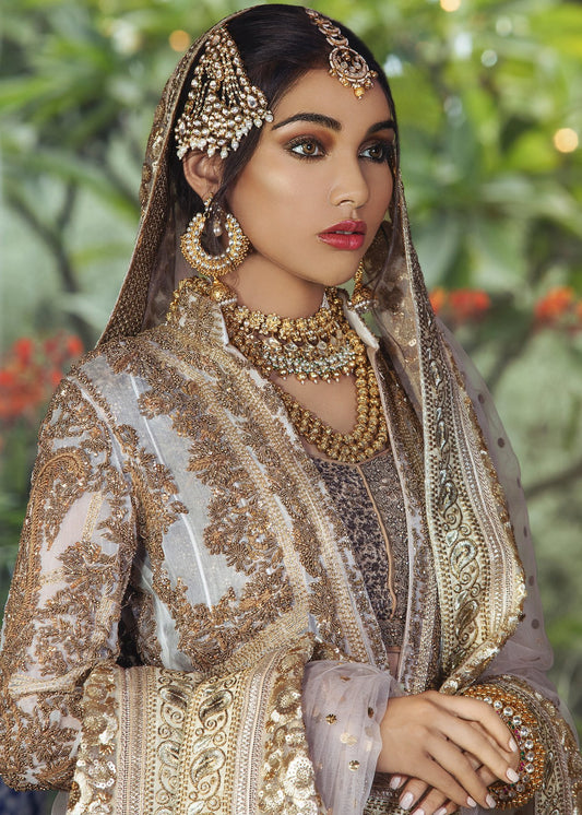 Pakistani Bridal Lehnga In Champagne Color With Golden Embroidered Work # B6100