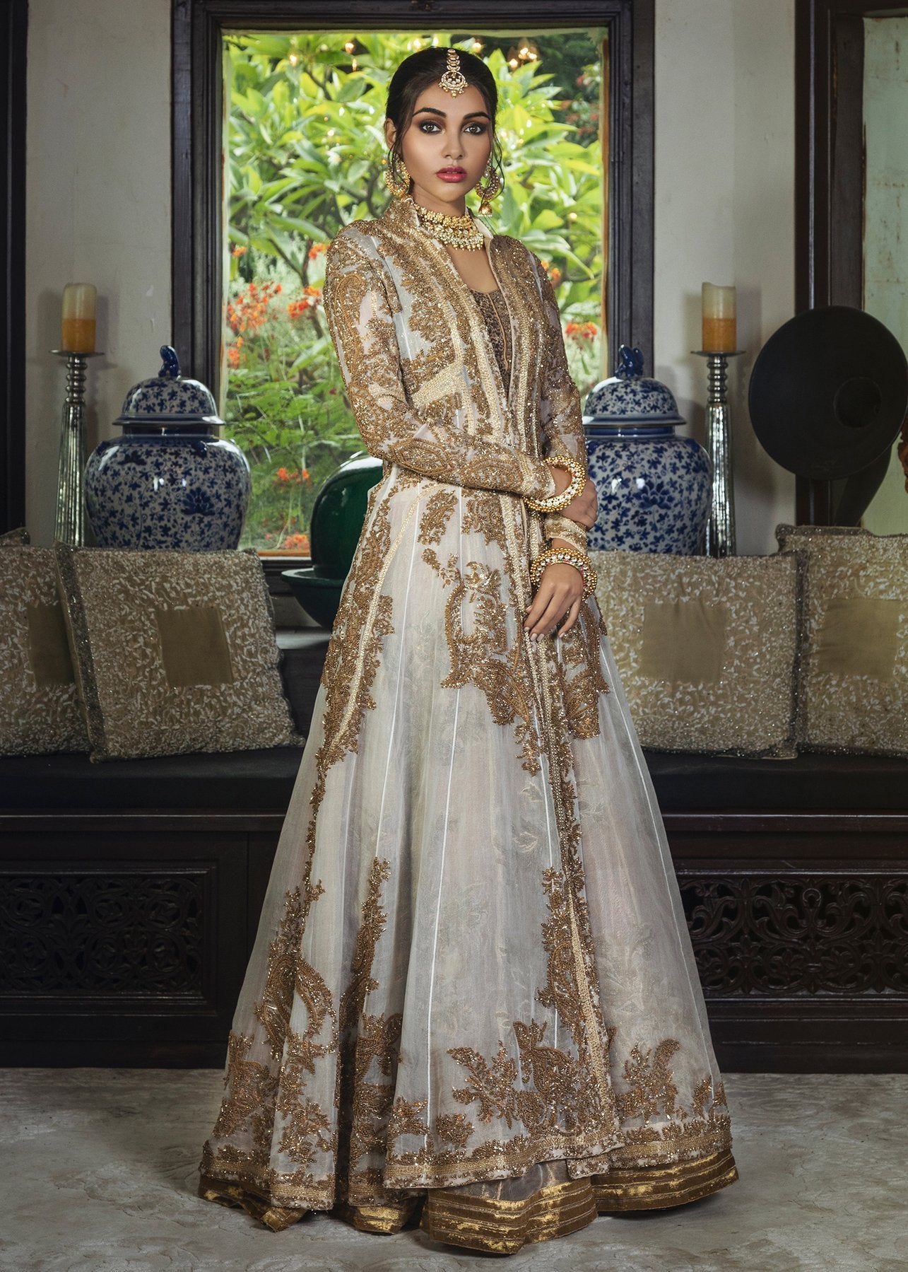 Pakistani Bridal Lehnga In Champagne Color With Golden Embroidered Work # B6100